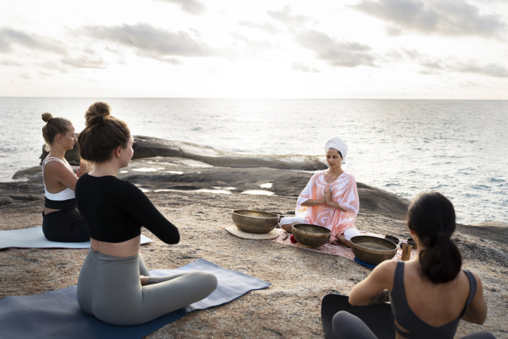 meditation guide with singing bowls sea