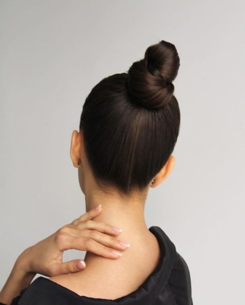 Woman with a top knot