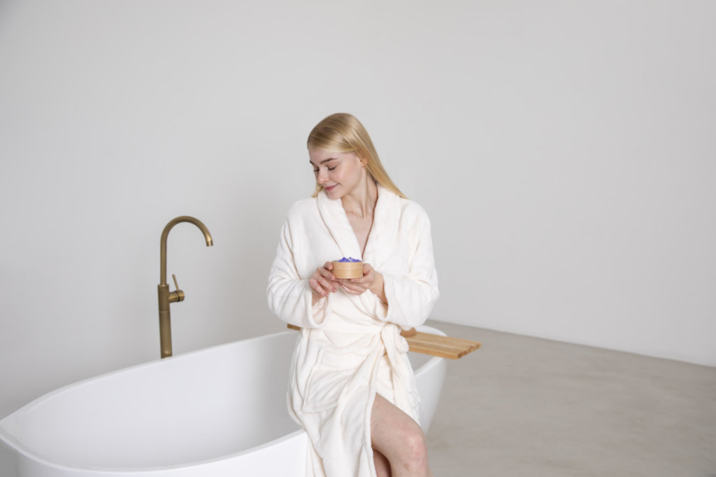 woman sitting bathtub